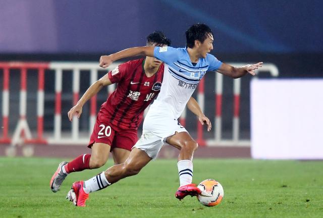 开云体育官网-国足增调常飞亚入队 韦世豪因伤暂无法正常训练